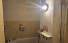Garsoniera 24mp. cu balcon, centrala, baie, hol si bucatarie