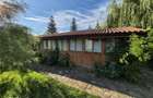 Cabana de lemn cu fundatie 86 mp+ livada pomi fructiferi+teren 847 mp