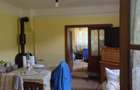 Casa de vanzare impreuna cu 2 terenuri intravilan , formand un tot unitar - 5