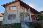 Casa individuala la rosu, intabulata - Uliuc - Sacosu Turcesc