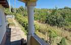 Casa in mediu rural cu teren