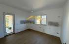 -Casa individuală -4 camere -2 băi -