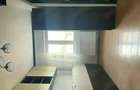 Vand apartament cu doua camere.