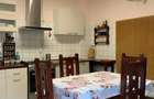 Vand casa situata central , str.L.Rebreanu , langa parcul din strand