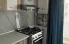 Studio 1 dormitor si living cu bucatarie + parcare 1 loc