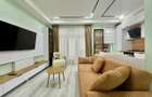 COSMOPOLIS - Apartament cu 3 camere si gradina, mobilat si utilat.