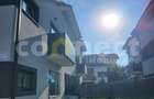 Apartament de 100mp, cu 70mp curte.
