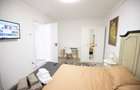 Inchiriez apartament doua camere decomandat zona centrala - 7