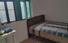 Inchiriez casa cu teren (5 camere + baie + bucatarie)
