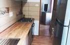Apartament 3 camere, parter și mansardă, centrală proprie – zona centrală
