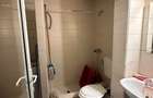 De vanzare apartament cu 2 camere si 2 bai, liber, pe Blv. Roman Musat - 1
