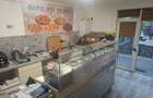 Afacere de vanzare Pizzerie 38 mp cu gradina de 25 mp utilata complet