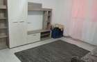 Inchiriez ap 2 camere,parter cu balcon,mobilat