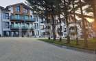 Apartamente cu curte - perfect: camin in inima naturii sau investitie