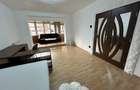 Inchiriez apartament cu 2 camere decomandat str Magheru etaj 1 - 1