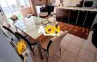 Casa 4 camere, 2 bai, 2 bucatarii, 1050 mp teren, zona Centru