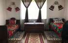 Proprietate cu poten?ial turistic reziden?ial: casa + 5.032 mp teren Puini, comuna Geaca, jud.