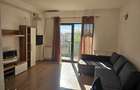 Garsoniera confortabila cu balcon ?i mobilier modern