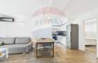 Apartament la parter ce are curte proprie , 2 camere in Bloc nou - 1