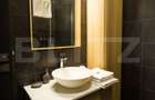 Apartament modern, zona centrala, cu parcare. Ocupabil de la 1 ianuarie