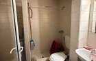 De vanzare apartament cu 2 camere si 2 bai, liber, pe Blv. Roman Musat - 1