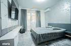Apartament cu 3 camere, mobilat ?i cu parcare proprie