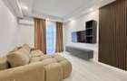COSMOPOLIS - Apartament cu 3 camere si gradina, mobilat si utilat.