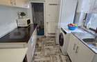 Casă din cărămidă, renovată integral, cu gospodărie în com. Cornățelu