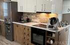 De inchiriat apartament la casa- zona UMF - 10