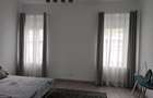 2 cam - zona Podgoria - la curte comuna