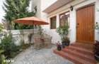 APARTAMENT 3/4 CAMERE PARTER// GRADINA - 1
