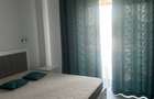 Ofer spre inchiriere apartament cu loc parcare si boxa demisol incluse - 1