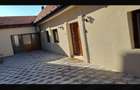 Casa de vanzare compartimentata in 3 apartamente - 1