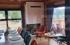 Cabana din bustean masiv si o suprafata de teren de 9000 mp in Vatra Dornei