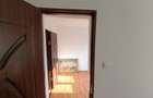 Apartament de vanzare 2 dormitoare, o sufragerie, 2 holuri, 1 bucatarie, 1 baie - 4