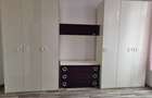 apartament central cu o camera bucatarie si baie dau in chirie