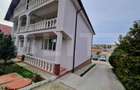 Casa cu 2 apartamente, mansarda si teren 1000 mp Tomesti