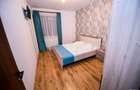 Apartament la parter cu gradina