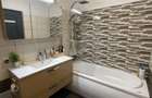 Apartament 2 camere 74,46 mp utili + terasa 6,31 mp, garaj subteran + loc de parcare exterior, boxa, complet mobilat si utilat. - 6