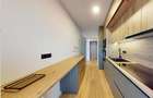 Apartament modern, cu 3 camere, 2 bai, 2 locuri de parcare - H. Coanda