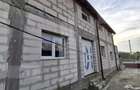 Casa P+M la ro?u, teren 582 mp, garaj dublu, doua intrar