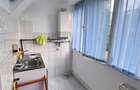 Apartament cu 3 camere semidecomandat în Central - 9