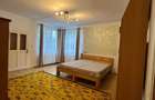 Apartament cu intrare separata, parter, curte si parcare