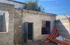 Vand constructie la rosu . 750 mp teren intravilan
