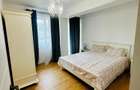 Inchiriez apartament nou 450 pe luna - 2