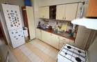 3 camere cu living de 31 mp, dormitoare de 14 și 12, bucătărie de 10,  centrală - 7