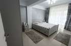 Intabulat.Vand apartament 2 camere decomandat, mobilat si utilat, 2 locuri parcare, lift, boxa.