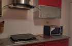 Inchiriere garsoniera decomandata la casa cu curte si garaj interior - 2