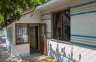 Casa cu livada si teren 1.947 mp teren, langa Husi