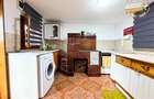 Casa cu teren generos de 1.315 mp, bucatarie de vara complet renovata si acces d